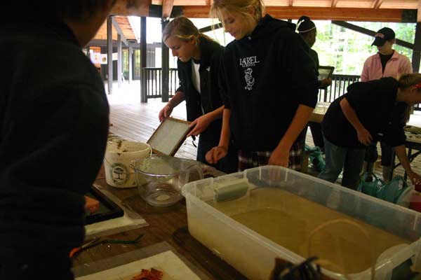 Girls from Laurel School making paper