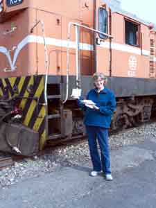 Jane in front of train