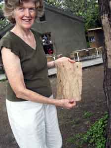 Jane with paper that dried on the pine tree