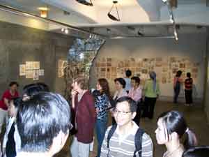 visitors looking at the exhibit