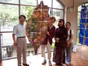 Dr. Hwang, his children and Jane in front of the Taiwan Site Map