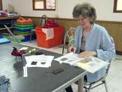Jane making the paper sample book for Liouguei