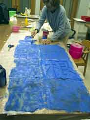Jane painting blue on Kinmen Lion Site Map