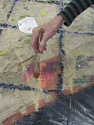 A close up of Jane painting on the Pingtung Site Map - Hengchun City
