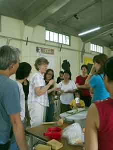 Jane demonstaring paper making for students